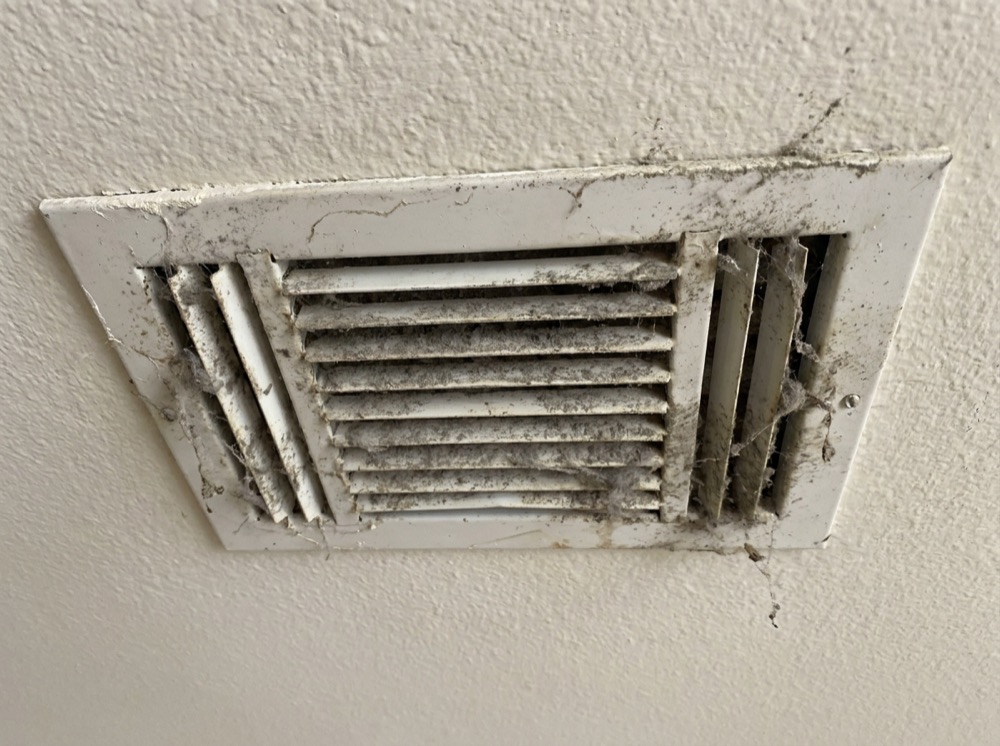 Dust-caked registers and ductwork